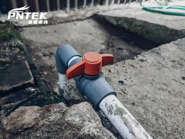 A PVC Ball Valve That Has Gone Bad A brittle, sun-damaged PVC valve next to a new, pristine Pntek valve