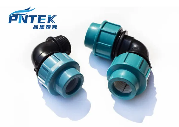 Assortment of PP Compression Fittings An assortment of Pntek PP compression fittings like elbows, tees, and couplers