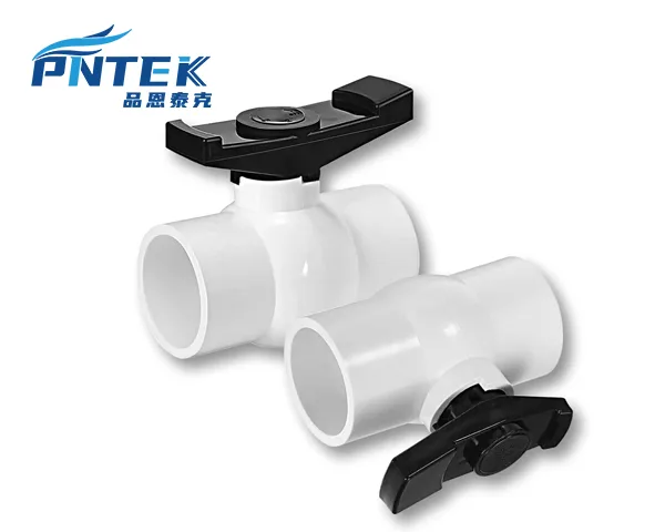 Various PVC Socket Fittings A pile of various PVC fittings like elbows, tees, and couplings, all showing their socket ends