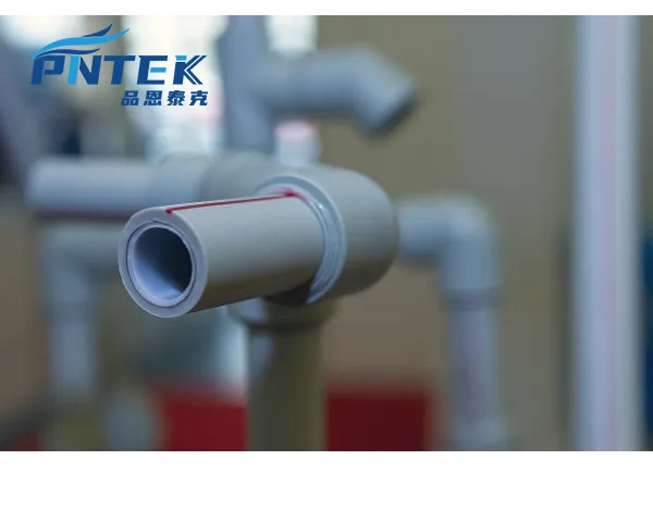 PPR Heat Fusion Welding Process A close-up shot of a heat fusion welding tool connecting a PPR pipe and fitting