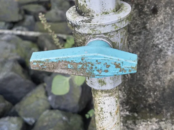 Causes of a Stiff Ball Valve A cutaway view of an old valve showing scale and mineral buildup inside