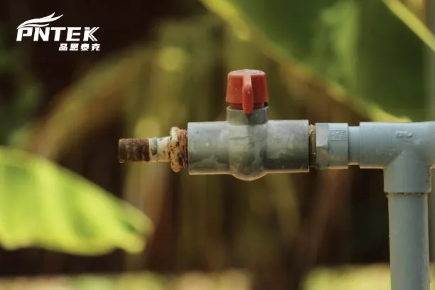 Loosening a Stiff Ball Valve with Gentle Heat A person gently warming a PVC ball valve with a hairdryer, avoiding excessive heat